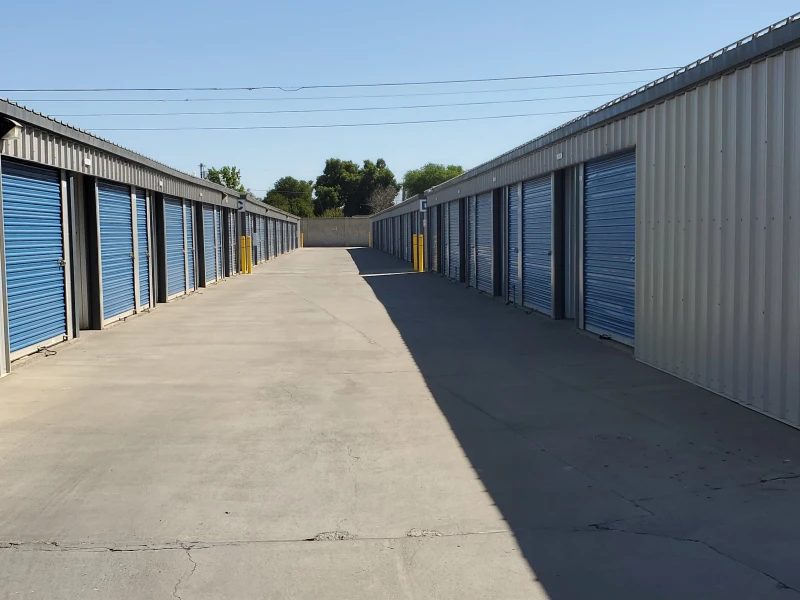 long row of storage units with blue doors