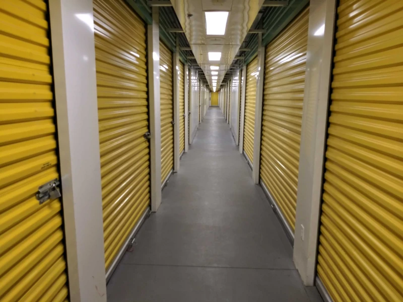 hallway of yellow interior storage units